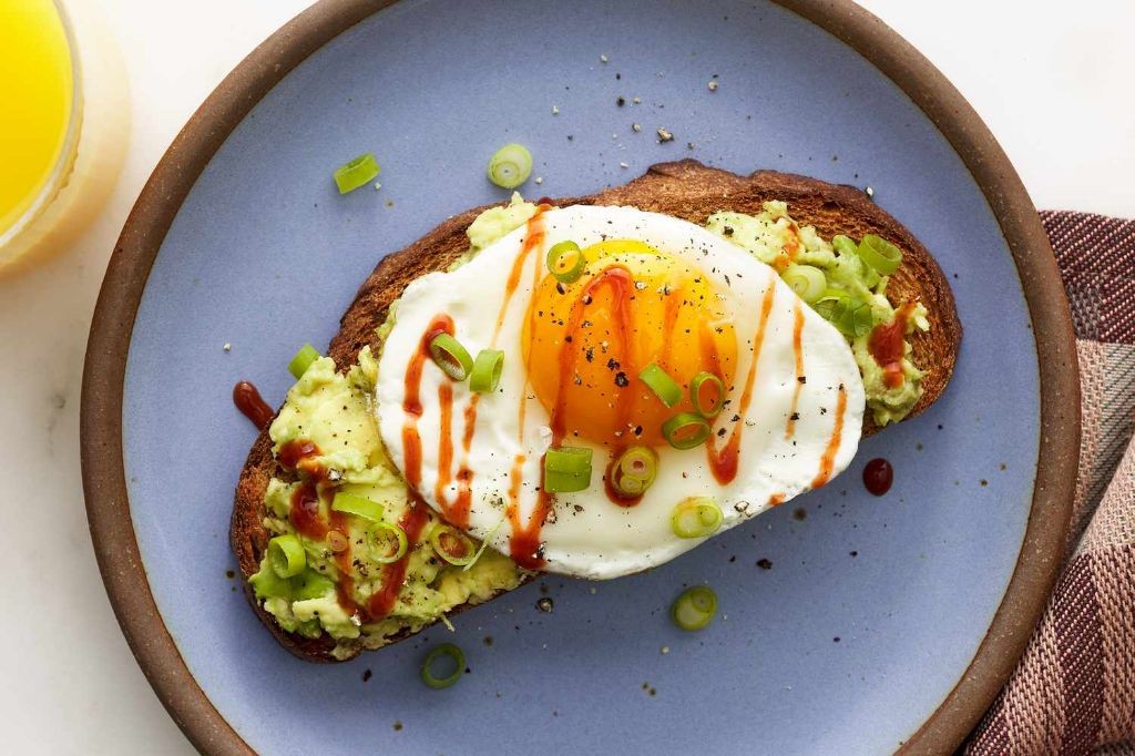 Avocado and Egg Toast on Whole Grain Bread
