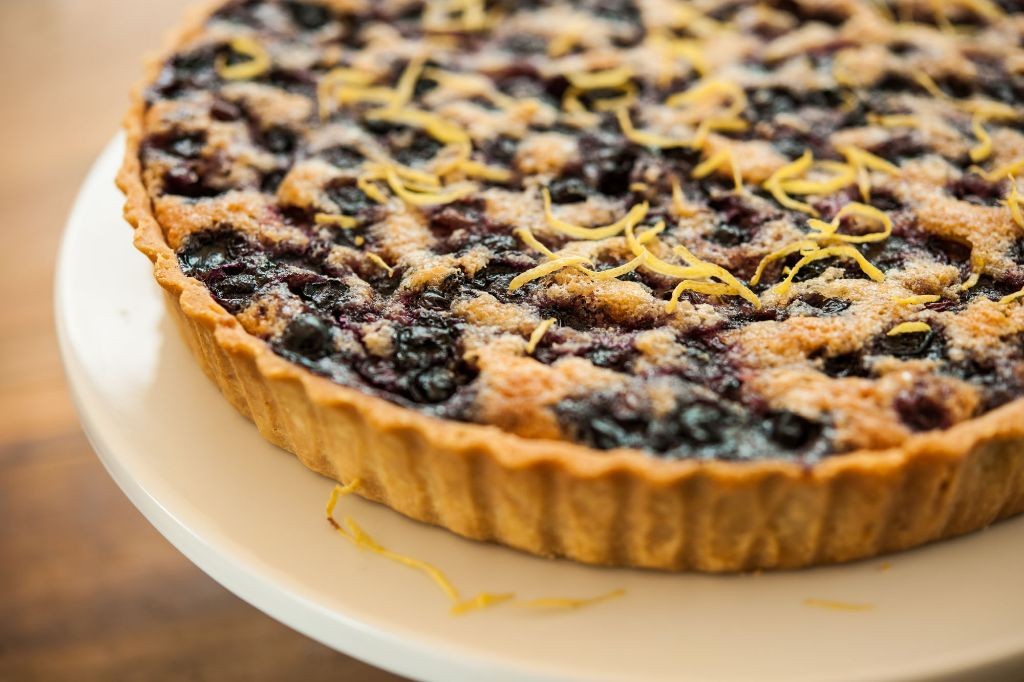 Blueberry and Almond Tart with a Powdered Sugar Dusting