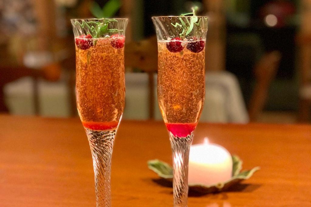 Cranberry Sparkler with Rosemary Garnish