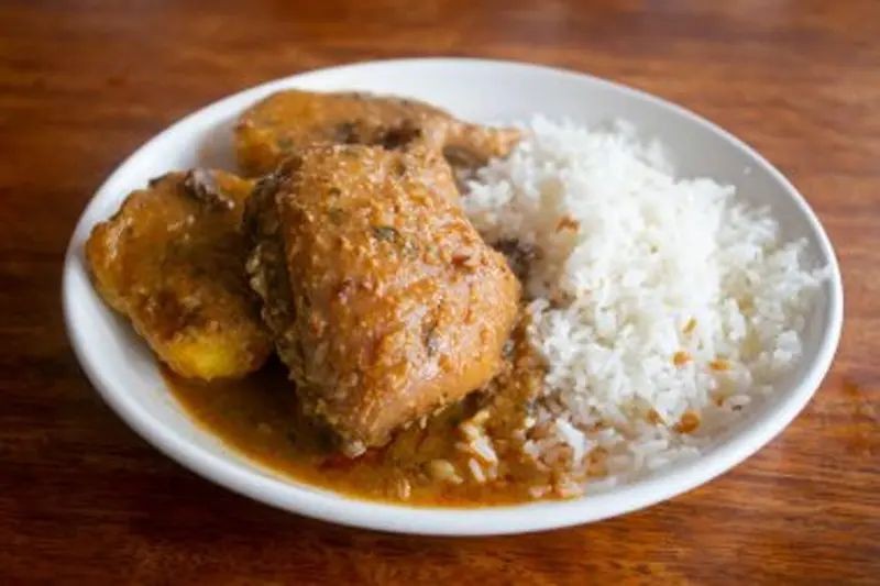Guinea Pig Curry with Coconut Milk and Rice