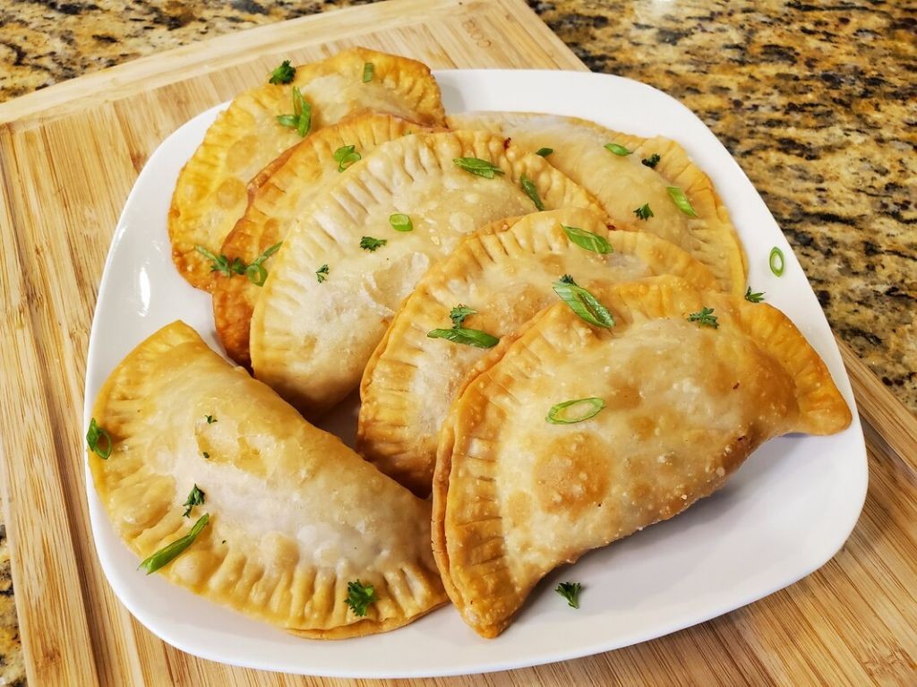 Guinea Pig Empanadas with Cheese and Onions