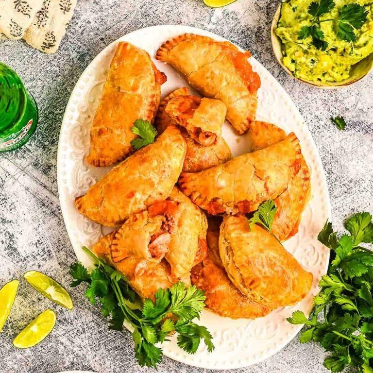 Tinga de Pollo Empanadas with Lime Crema