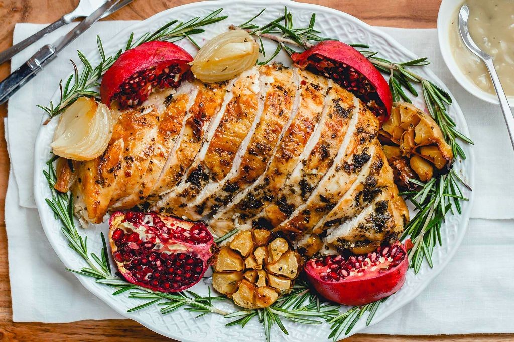 Turkey Cutlets with Herb Butter and Roasted Carrots