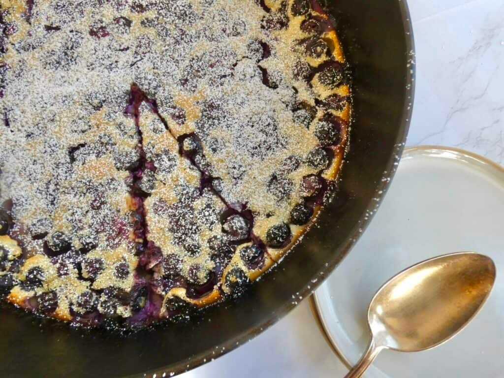 Wineberry Clafoutis with a Dusting of Powdered Sugar