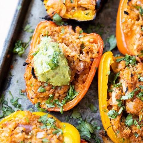BBQ Chicken Stuffed Bell Peppers with Rice and Cheese