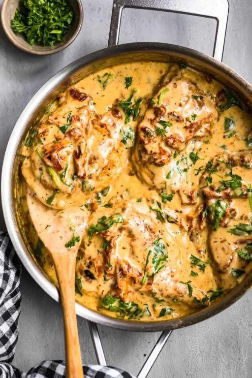 Baked Tuscan Chicken Thighs with Parmesan Cream Sauce