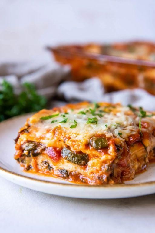 Cheesy Dutch oven vegetarian lasagna with spinach