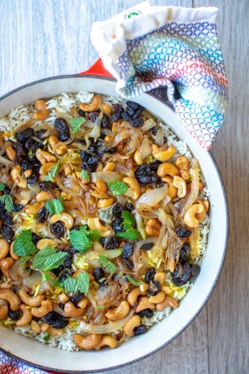 Dutch oven vegetable biryani with cashews and raisins