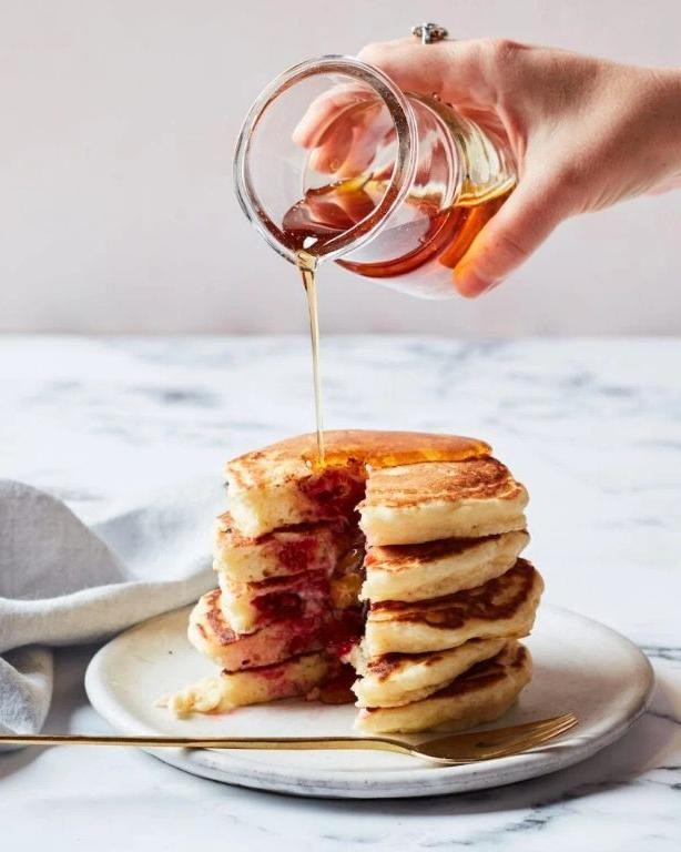 Fluffy Raspberry Pancakes with Maple Syrup