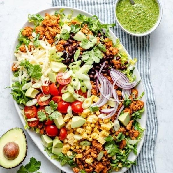 Ground chicken taco salad with avocado dressing