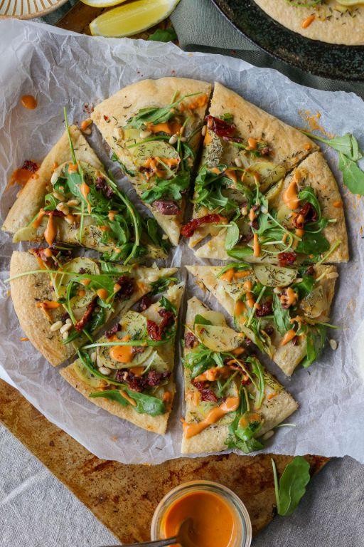 Pesto Arugula Pizza with Roasted Garlic