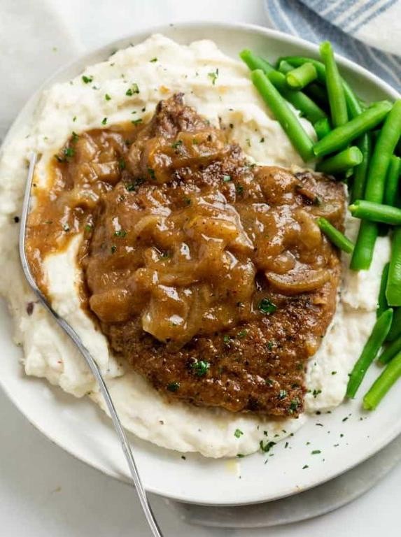 Pork Cube Steak and Gravy over Mashed Potatoes