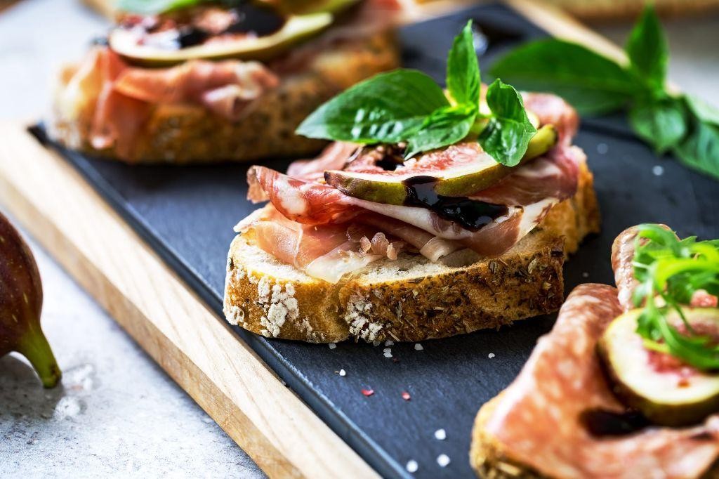 Prosciutto and Pear Bruschetta with Honey Drizzle