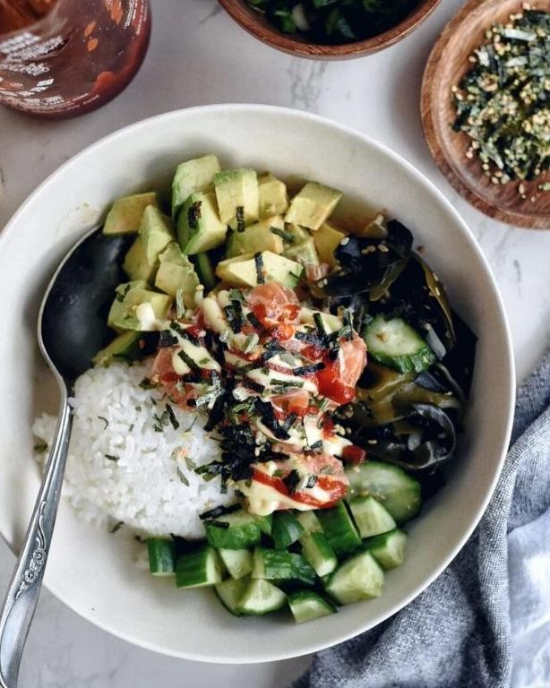 Salmon Poke with Cucumber and Seaweed Salad