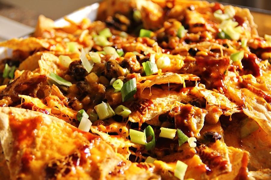 Spicy BBQ Chicken Nachos with Black Beans and Cheese