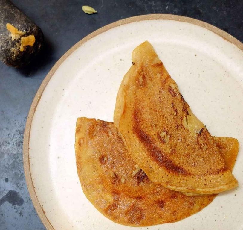 Sweet Oat Dosa with Jaggery and Cardamom