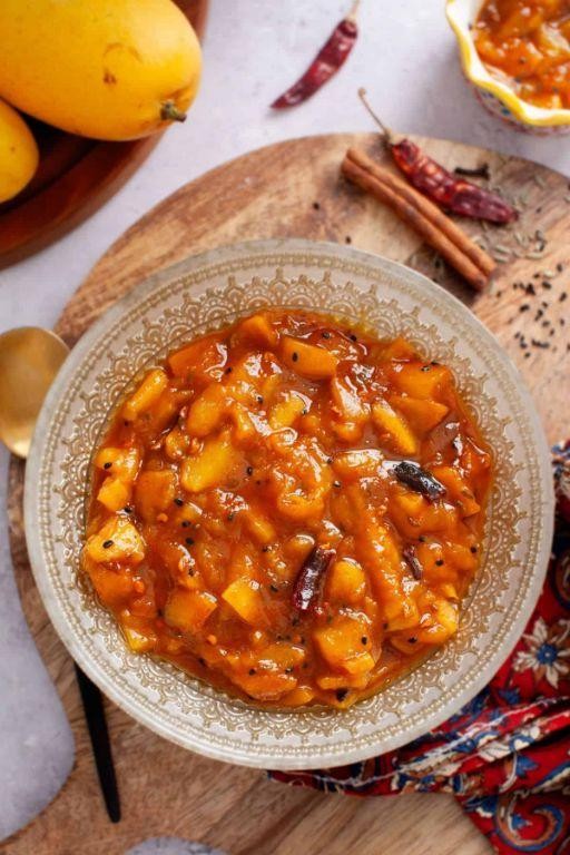 Tangy mango chutney with mustard seeds and turmeric