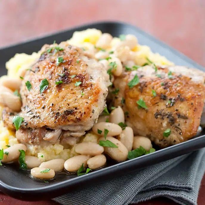 Tuscan Chicken Thighs with Creamy Polenta